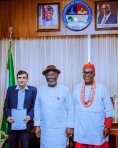 Governor Oborevwori with Olam Agri representatives at the presentation of land for a proposed animal feed production plant.